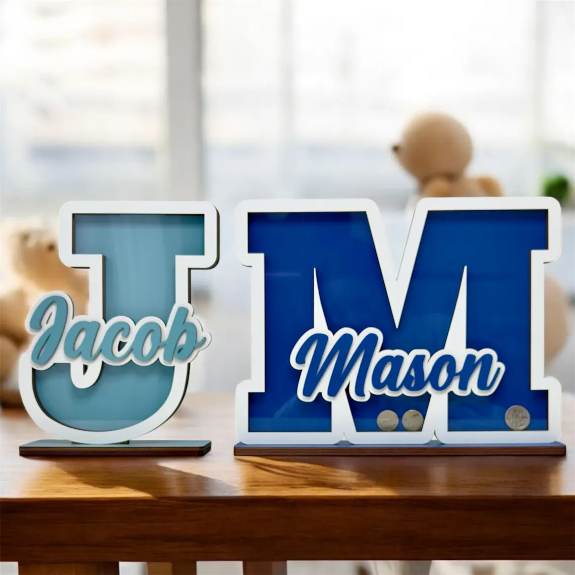 Decorative letters 'J' and 'M' with names 'Jacob' and 'Mason' on a wooden surface.