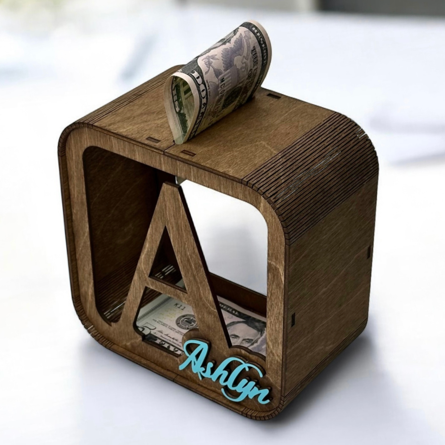 personalized wooden money box for children, stylish with the child's name in color