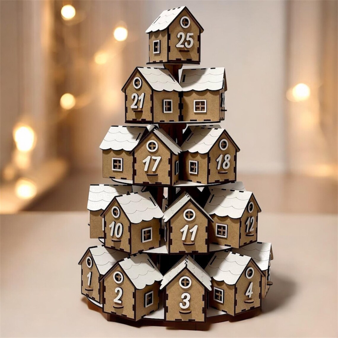 Wooden advent calendar with houses stacked in a pyramid shape 