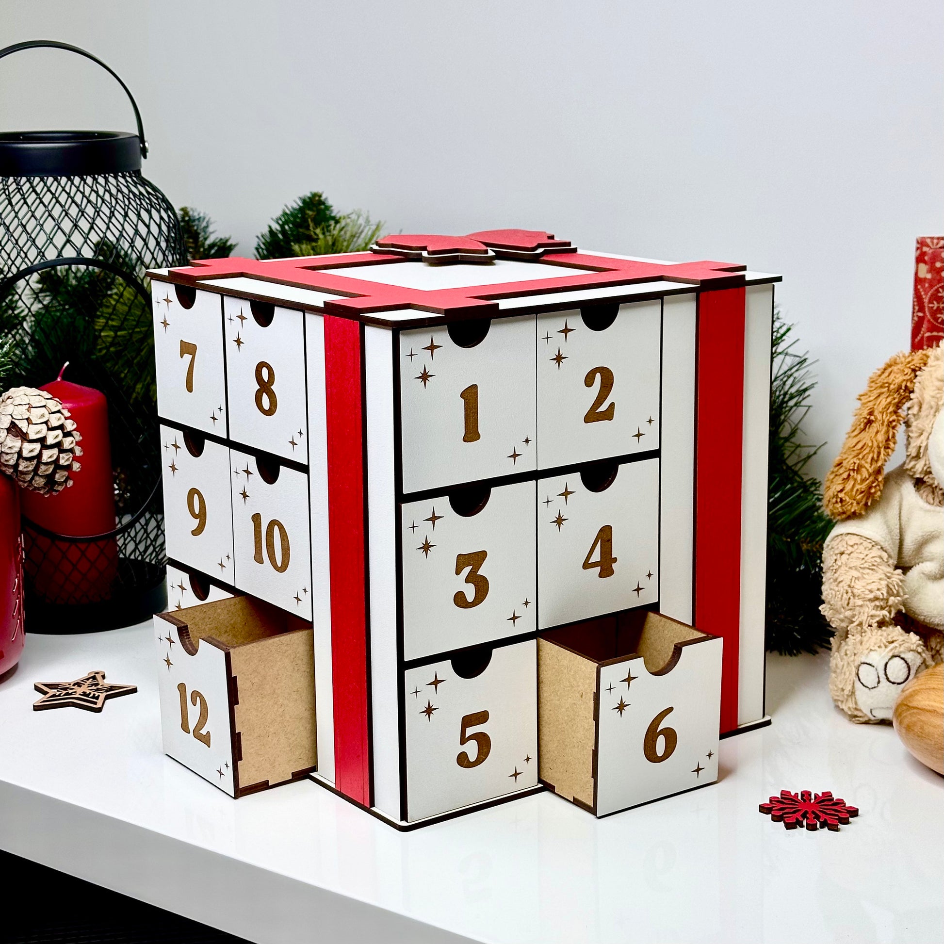 Wooden Christmas countdown box in cube shape with tiny gift compartments