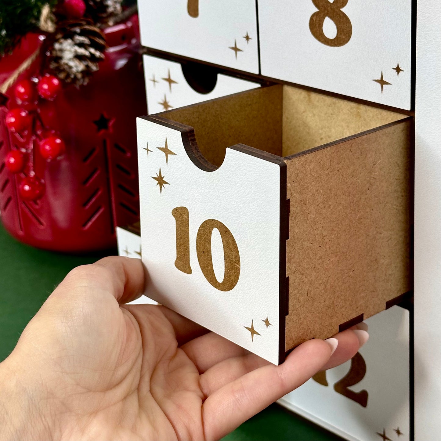 Handcrafted wooden Advent cube with drawers for holiday treats and notes