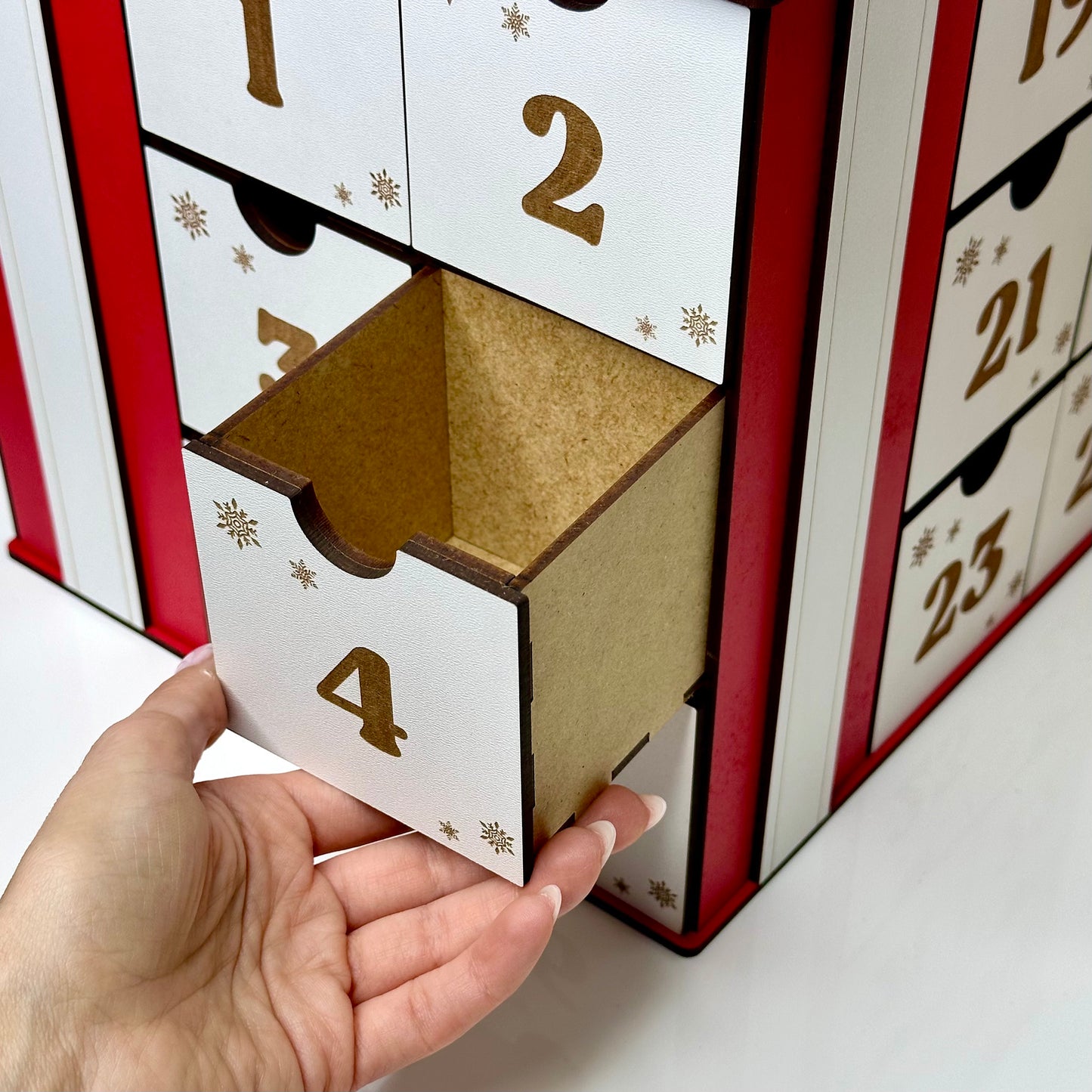 Handcrafted wooden Advent cube with drawers for holiday treats and notes