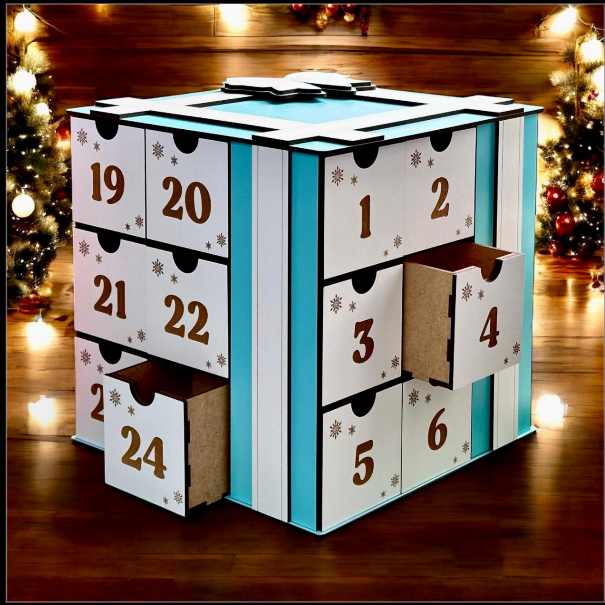 Advent calendar with numbered drawers in a festive setting with Christmas trees.