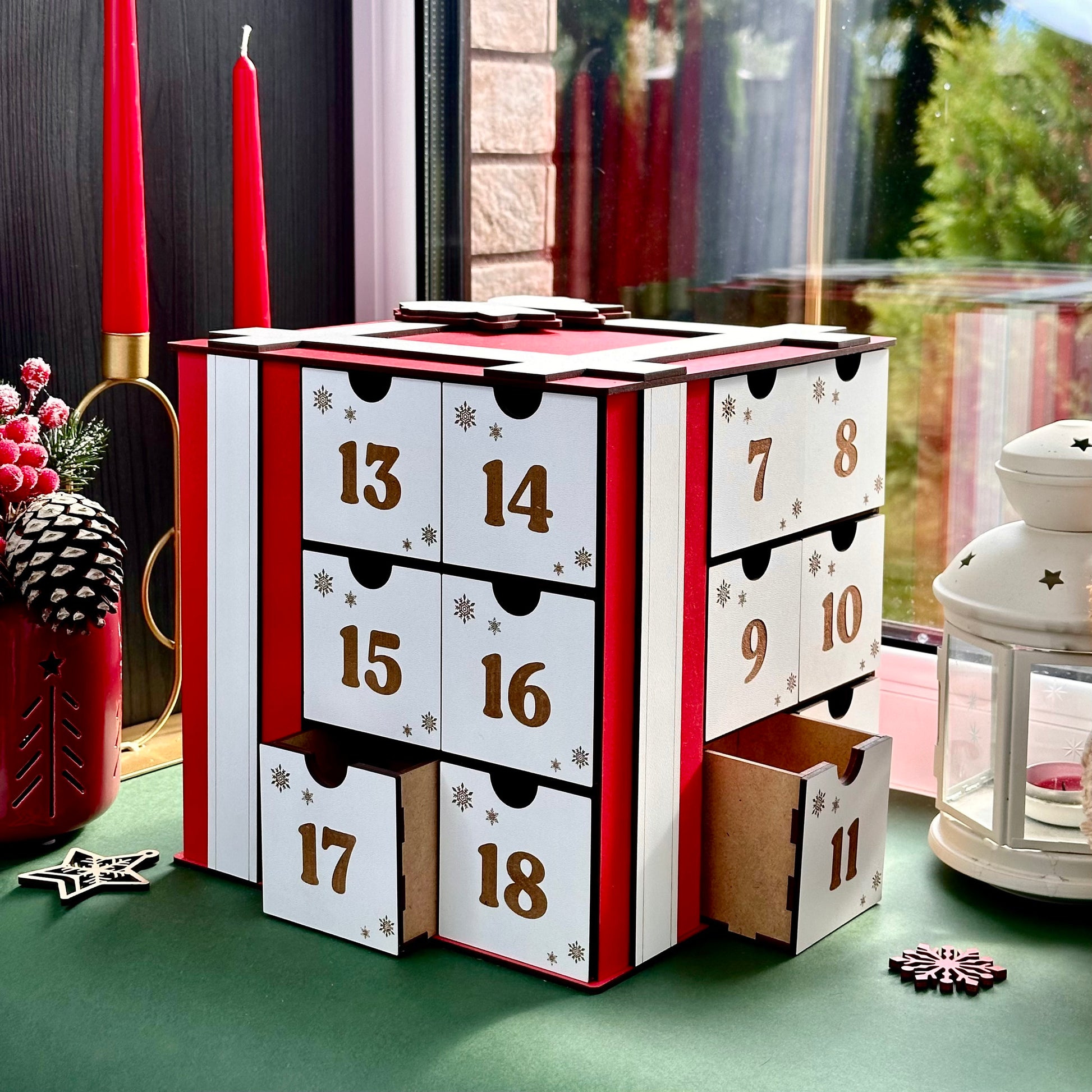 Wooden Christmas countdown box in cube shape with tiny gift compartments