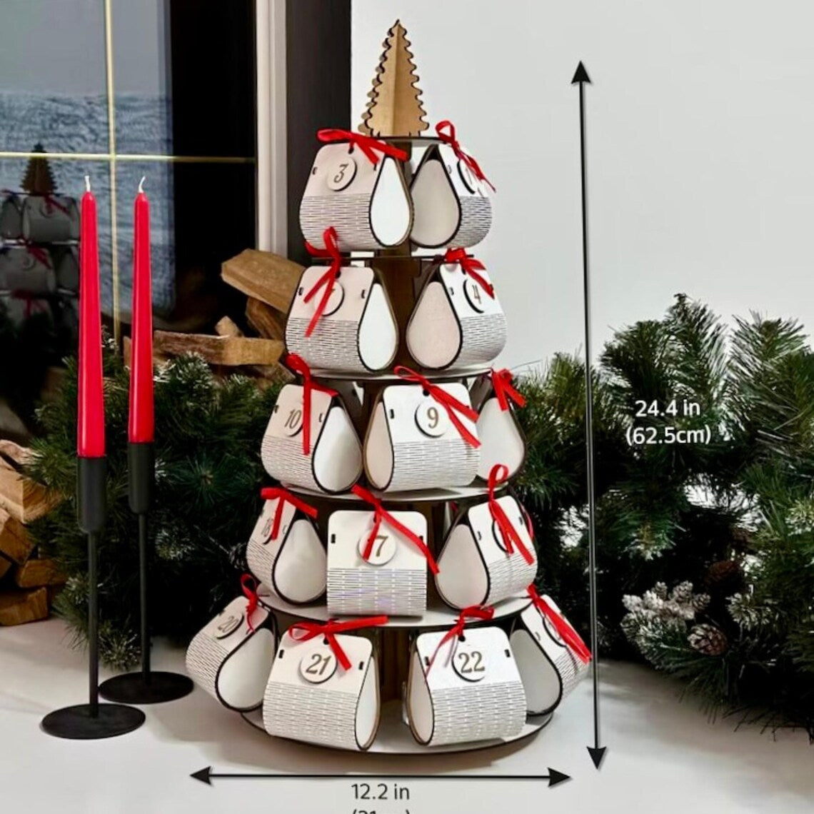 Decorative advent calendar with white boxes and red ribbons, set against a Christmas-themed background.