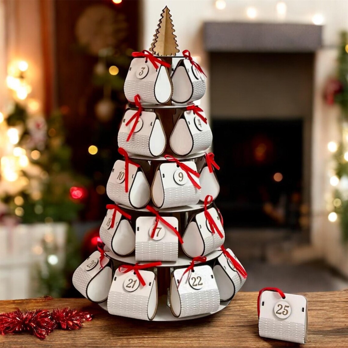 white wooden Advent calendar in the shape of a Christmas tree with spacious boxes