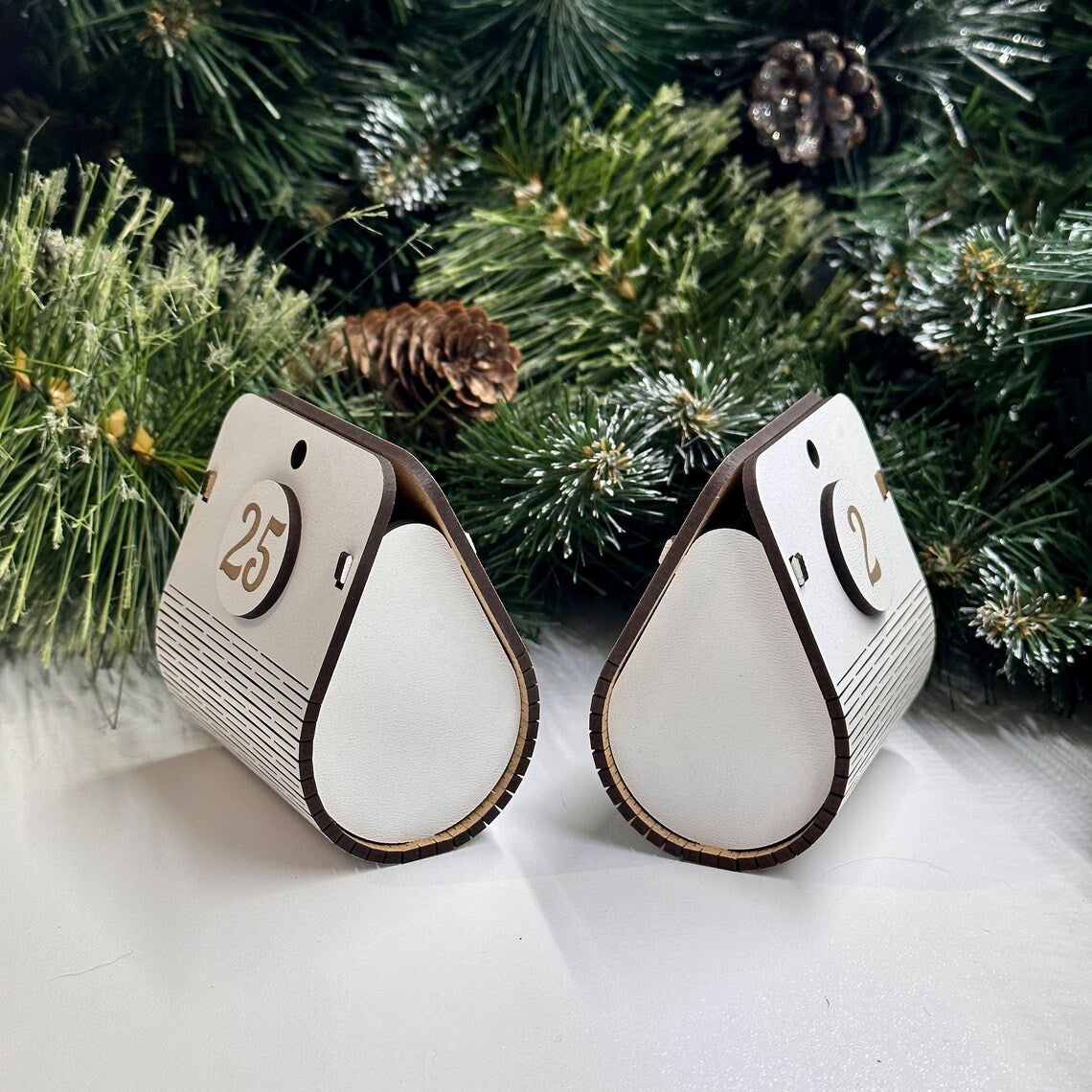 white wooden Advent calendar in the shape of a Christmas tree with spacious boxes