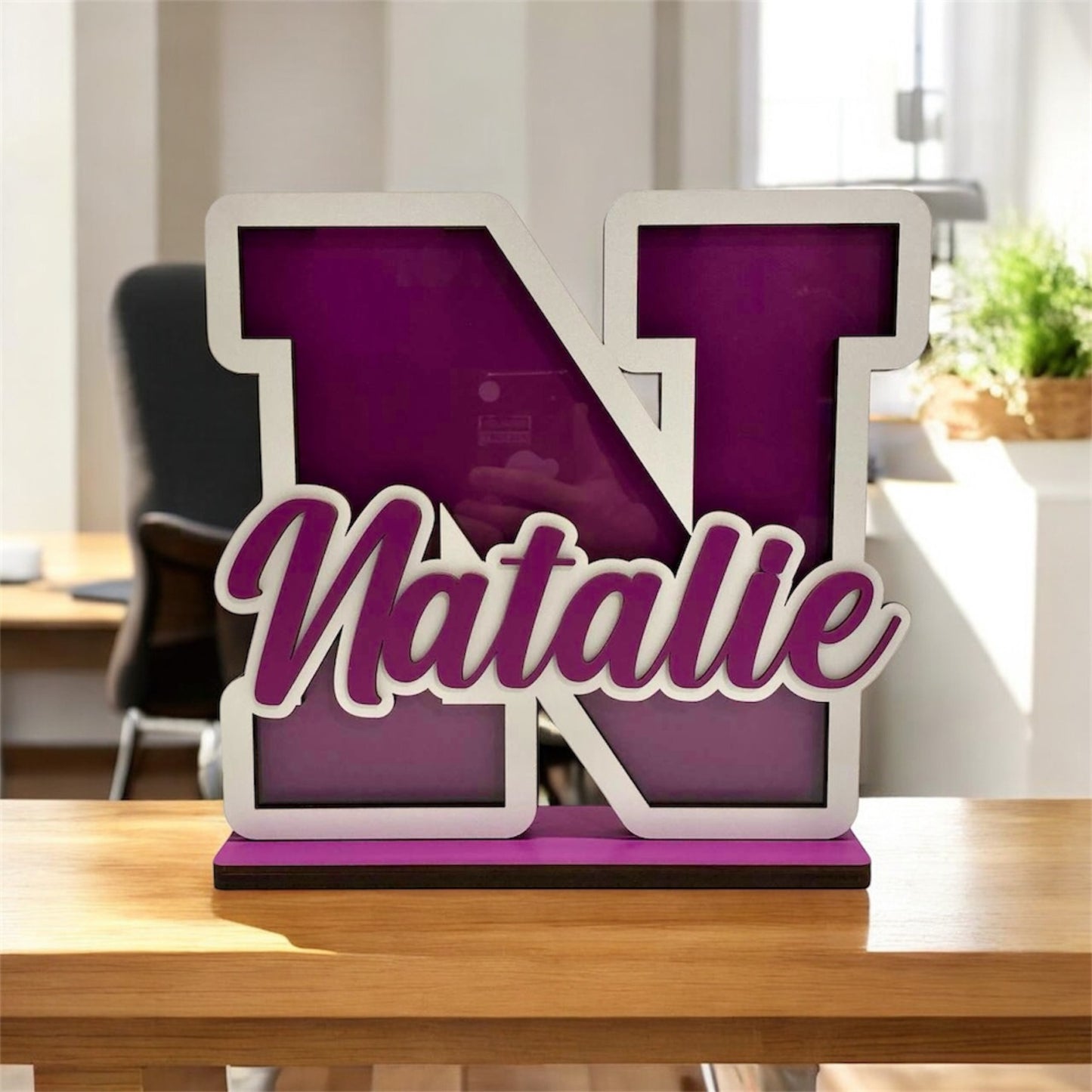 Decorative nameplate with 'Natalie' 