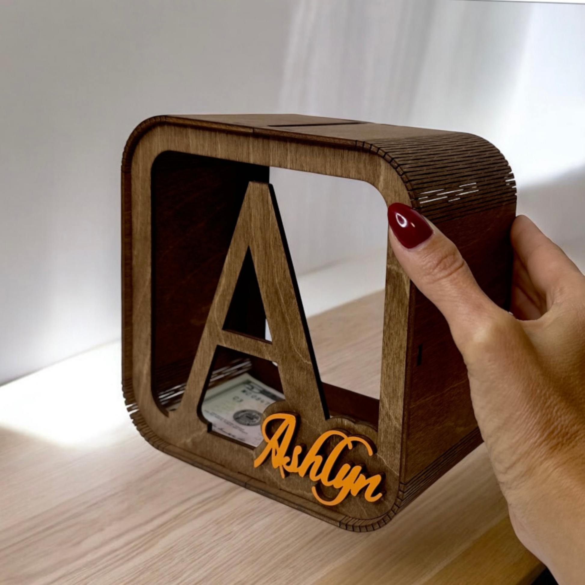 personalized wooden money box for children, stylish with the child's name in color