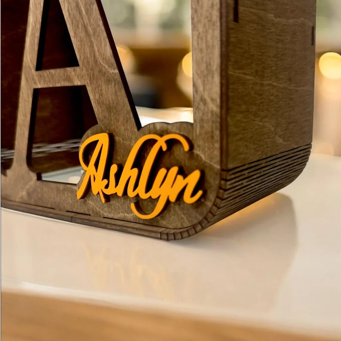 personalized wooden money box for children, stylish with the child's name in color