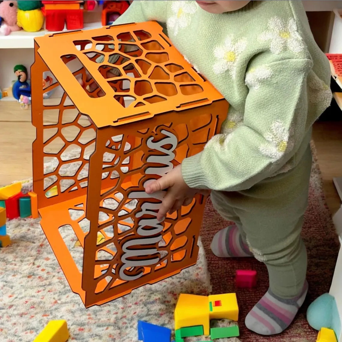 personalized wooden toy box for children, beautifully carved, with toys inside
