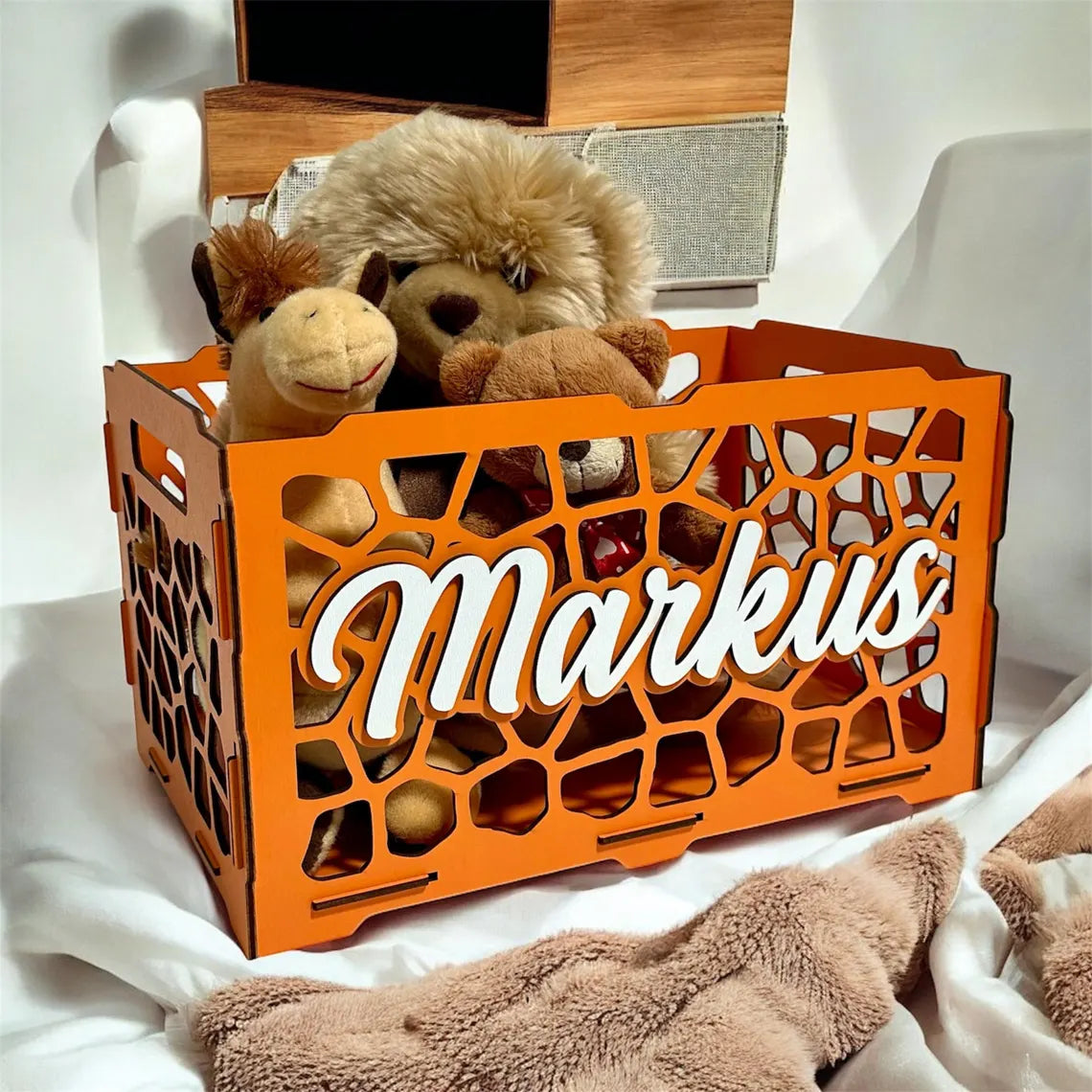 personalized wooden toy box for children, beautifully carved, with toys inside
