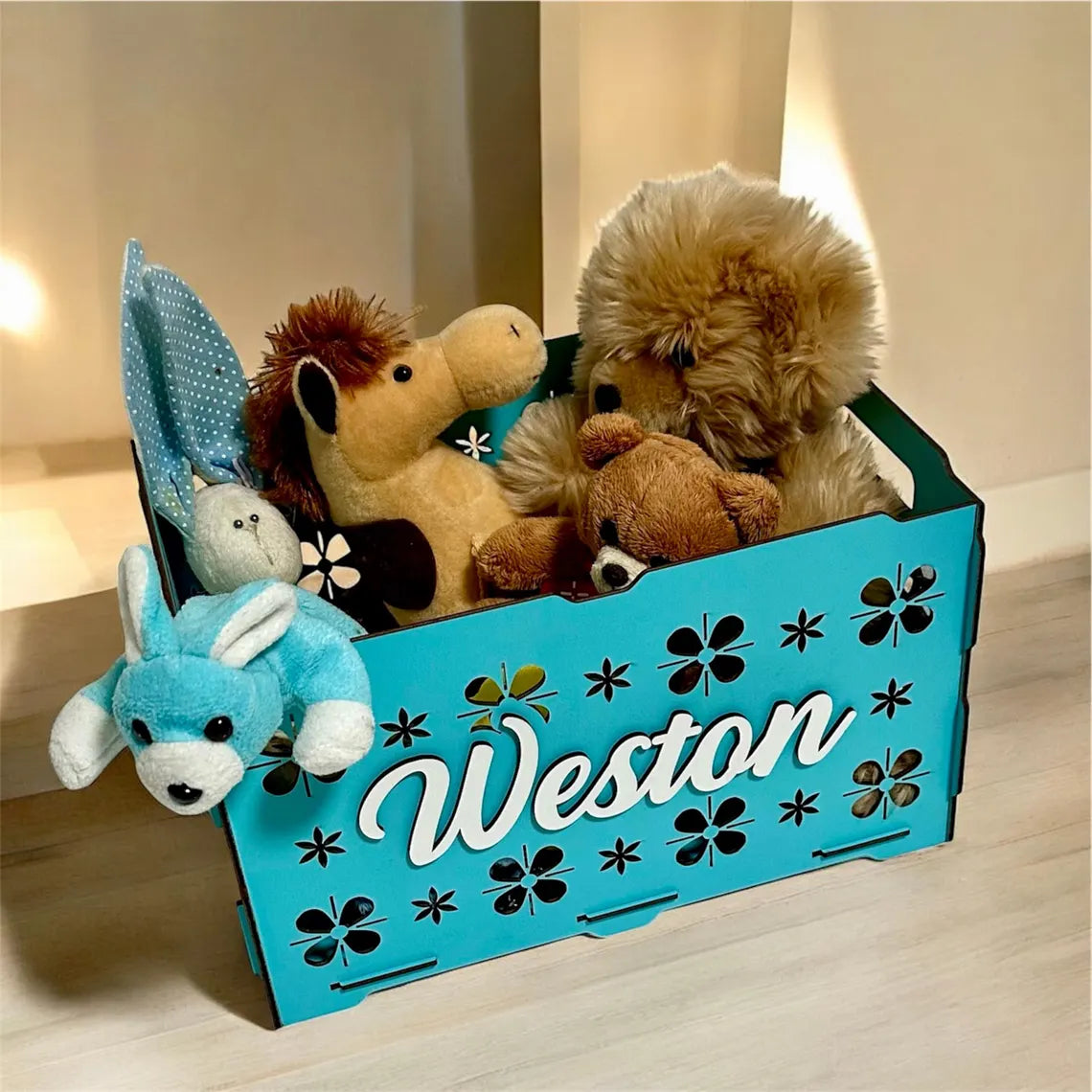 personalized wooden toy box for children, beautifully carved, with toys inside
