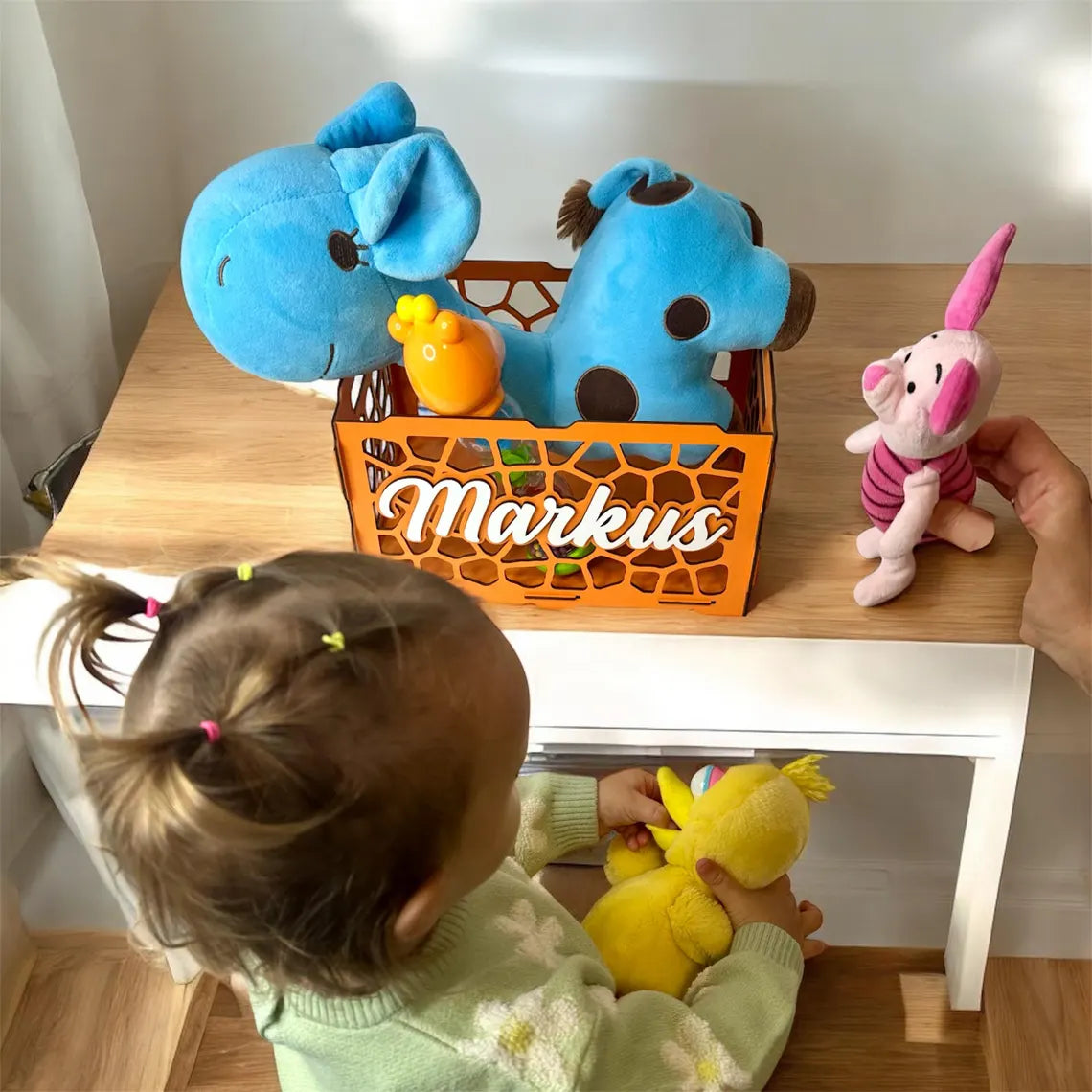 personalized wooden toy box for children, beautifully carved, with toys inside