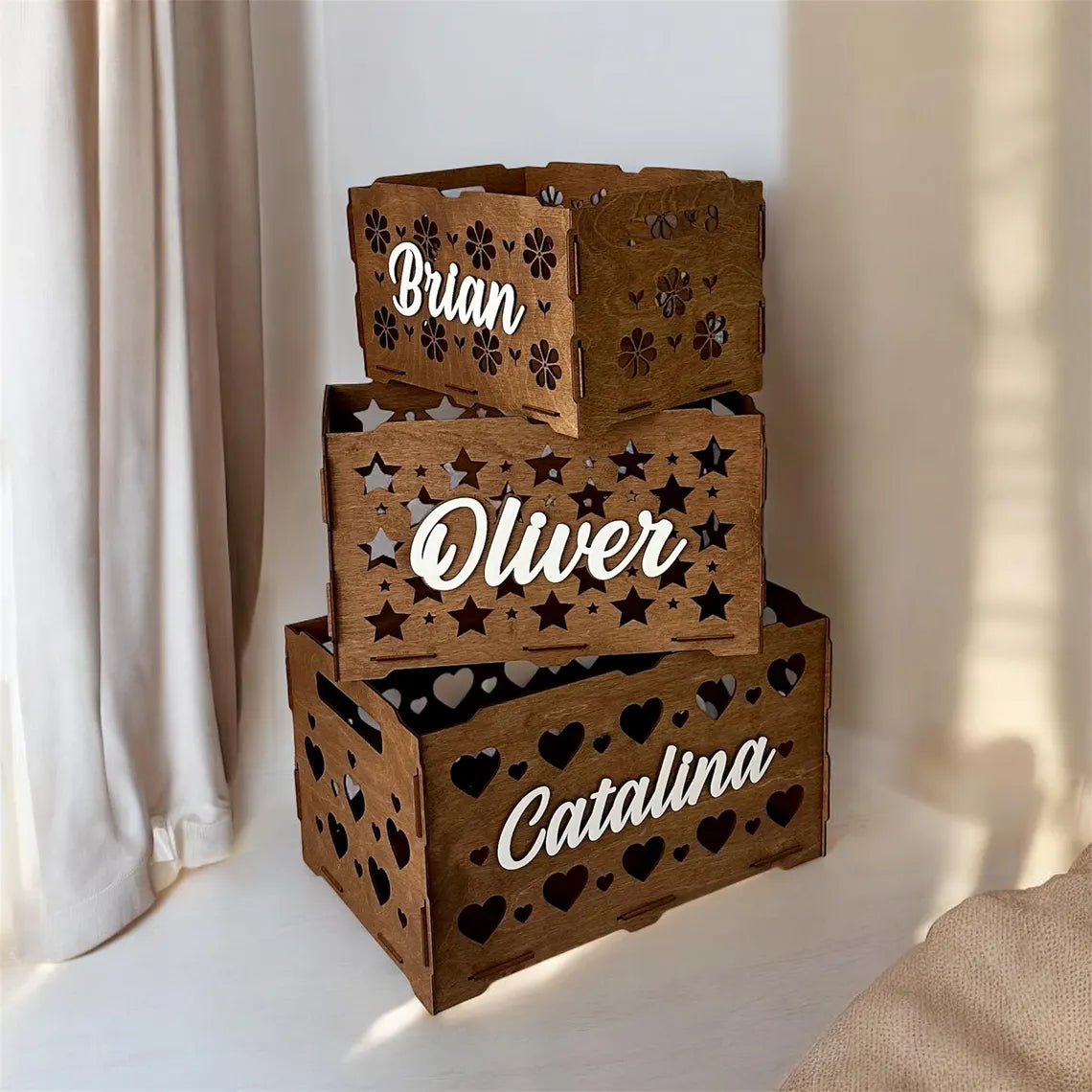 personalized wooden toy box for children, beautifully carved, with toys inside